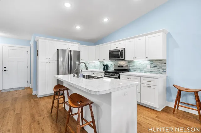 $332,500 | 86 Homestead Acres Road Northwest, Sparta, MI 49345