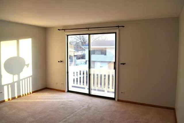 a view of a room with a large window