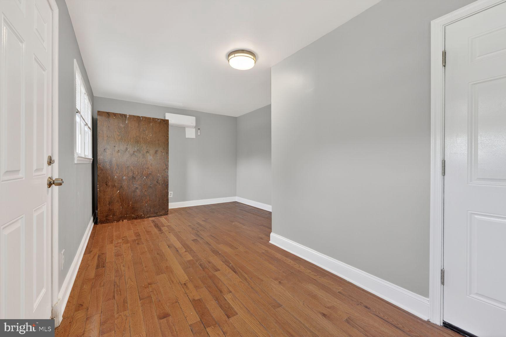 7205 Livingston Road Oxon Hill, MD 20745 - Photo 16 of 25 Spacious room with warm wood floors.