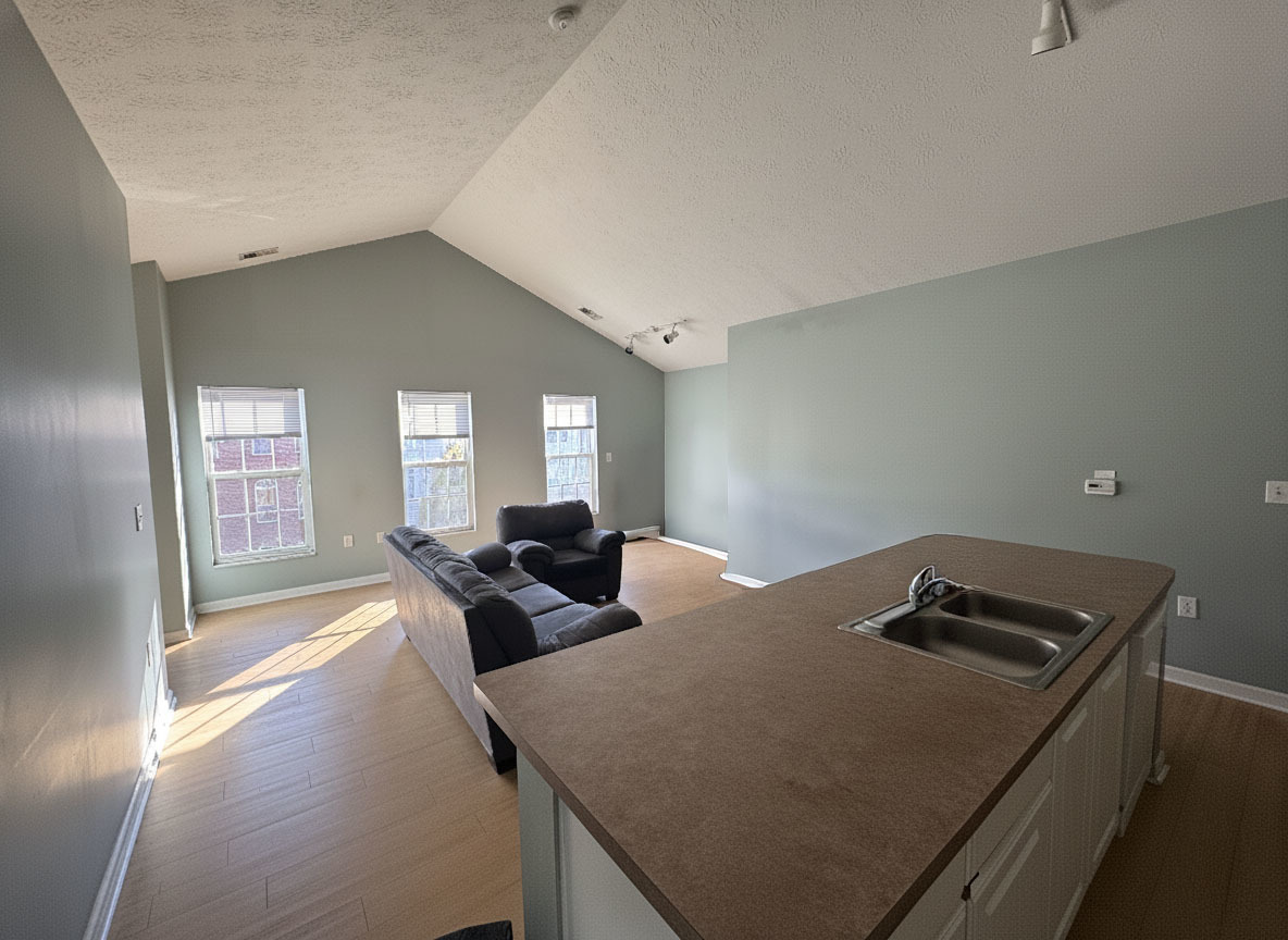 1905 North Lincoln Avenue, Unit 319 Urbana, IL 61801 - Photo 4 of 10 a bedroom with bed and window