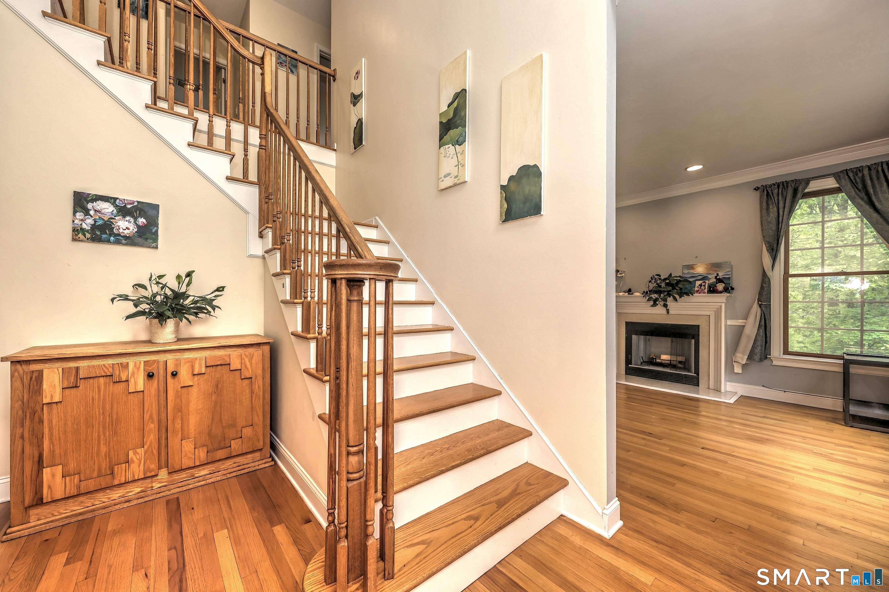125 Peck Hill Road Woodbridge, CT 06525 - Photo 4 of 40 a view of entryway and hall with wooden floor