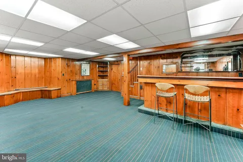 a view of a patio with a bench