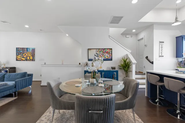 a dining room with furniture and a table