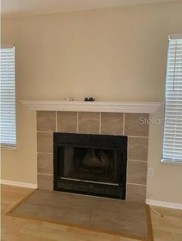 a living room with a fireplace