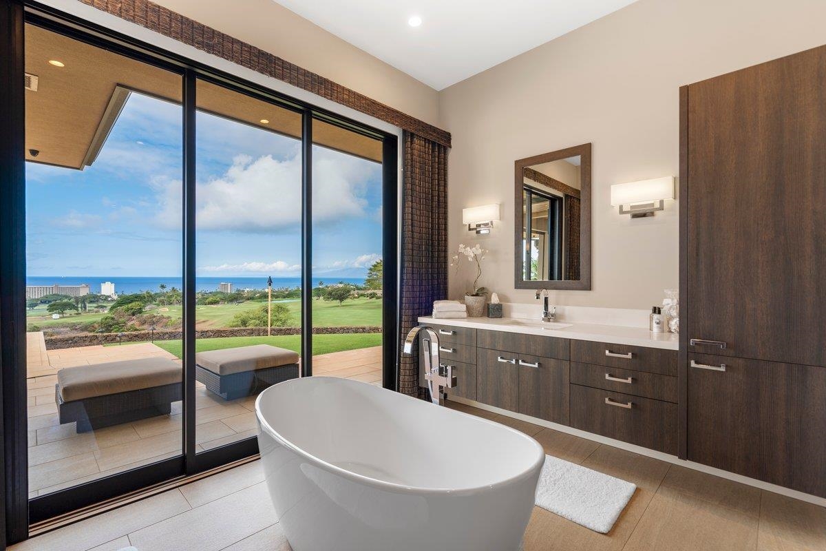 44 Anapuni Loop, Unit 3 Lahaina, HI 96761 - Photo 21 of 49 a bathroom with a large tub and sink