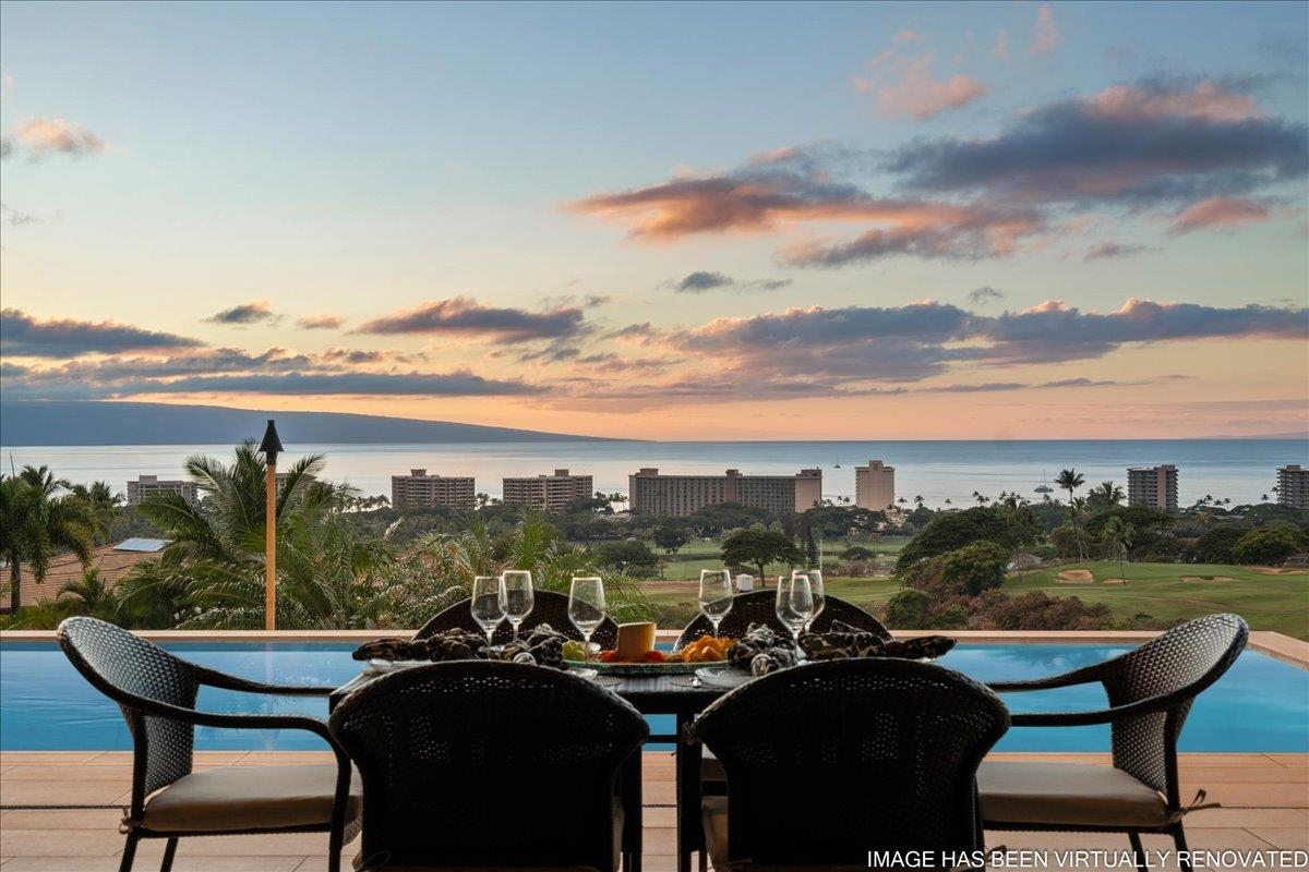 44 Anapuni Loop, Unit 3 Lahaina, HI 96761 - Photo 33 of 49 a view of a chairs and table in patio