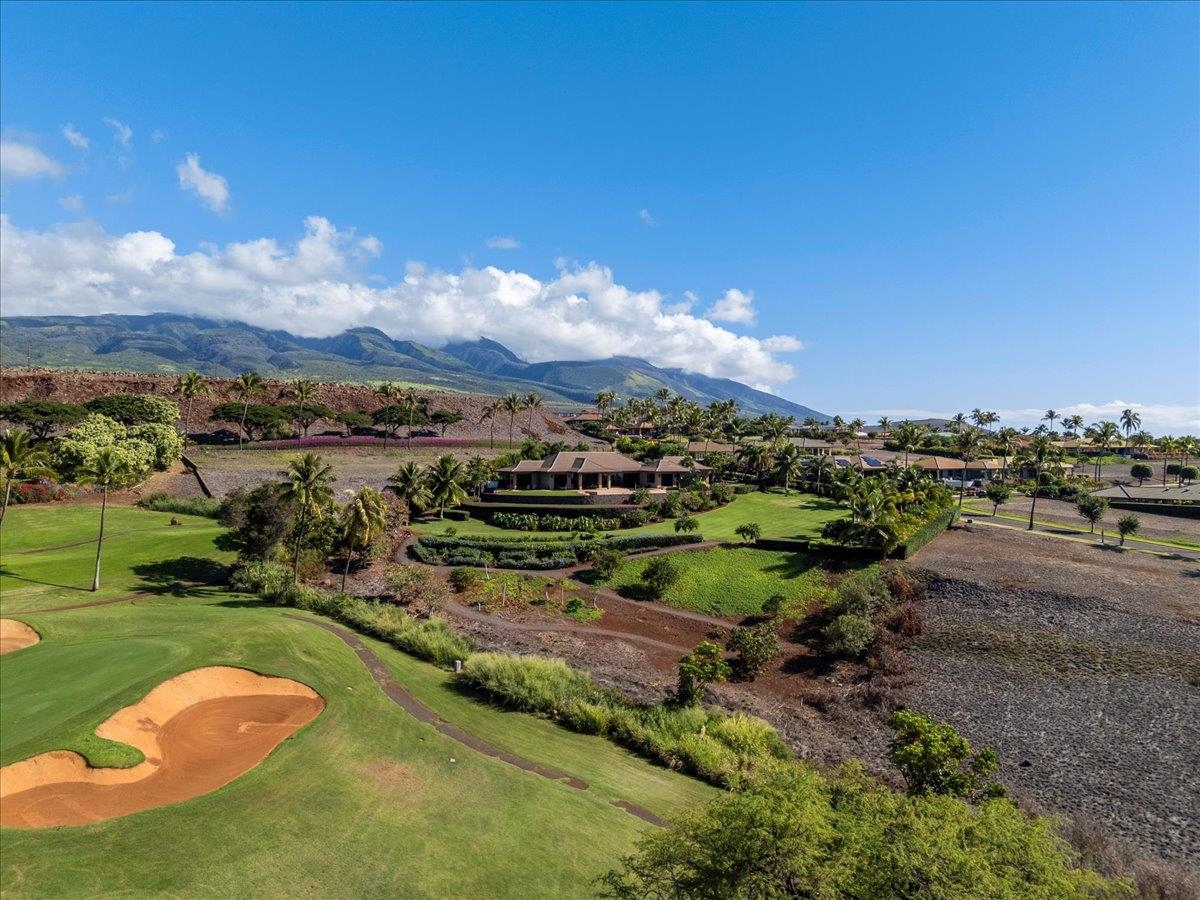 44 Anapuni Loop, Unit 3 Lahaina, HI 96761 - Photo 6 of 49 a view of a lake with a yard