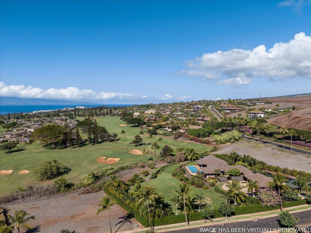 44 Anapuni Loop, Unit 3 Lahaina, HI 96761 - Photo 8 of 49 an aerial view of a houses with a lake view