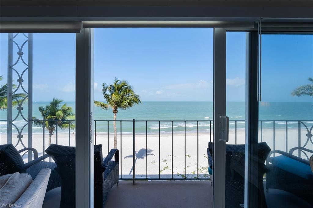 2011 Gulf Shore Boulevard North, Unit 45 Naples, FL 34102 - Photo 4 of 16 a view of balcony with furniture