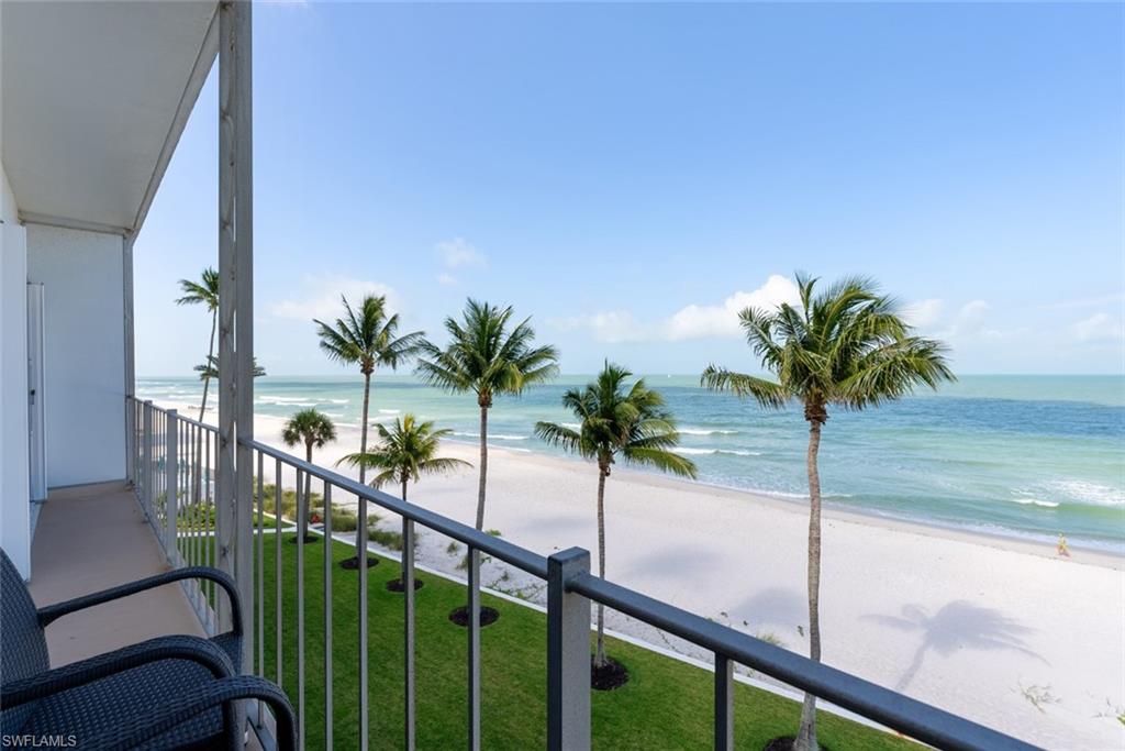 2011 Gulf Shore Boulevard North, Unit 45 Naples, FL 34102 - Photo 5 of 16 a view of a garden from a balcony