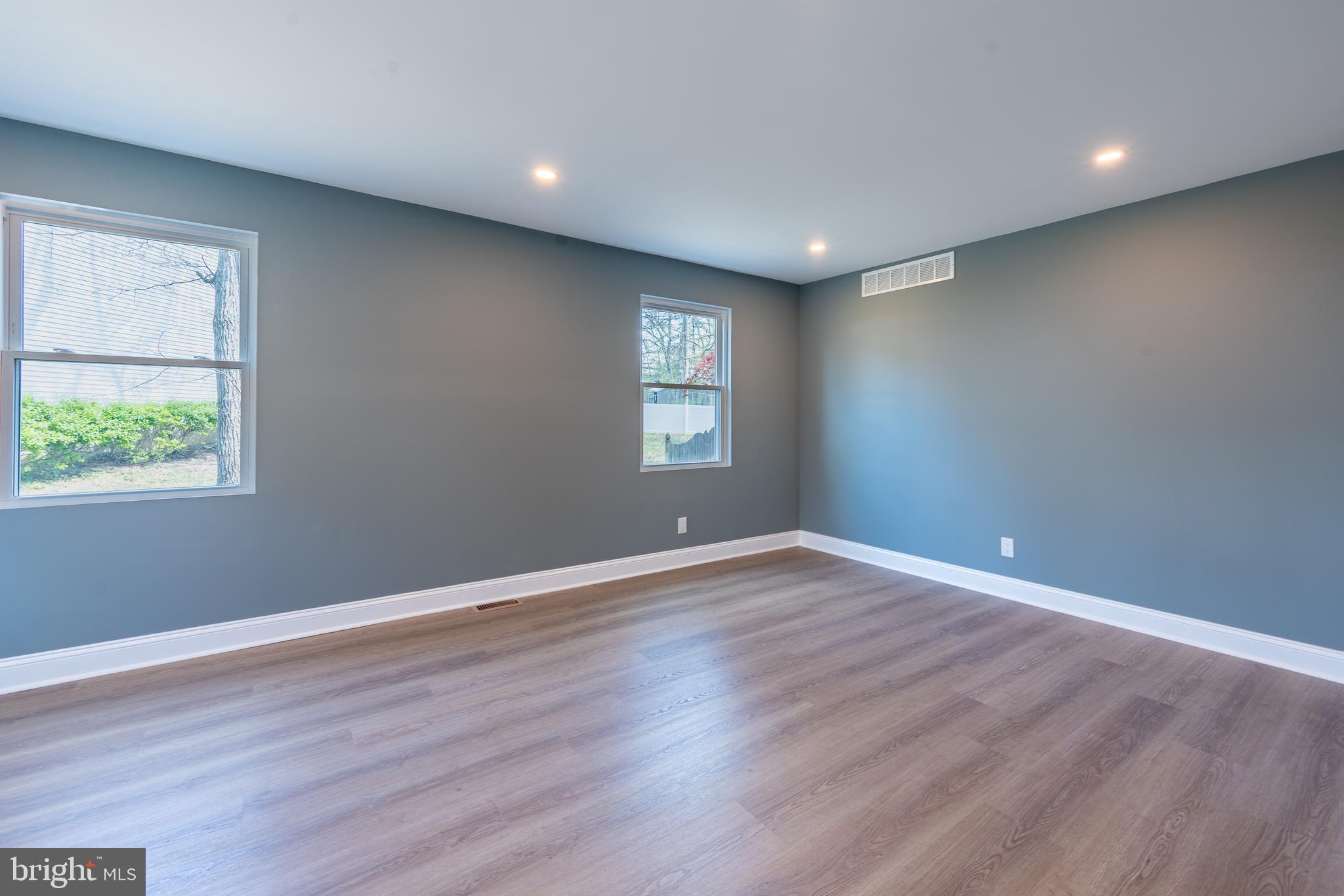 3 Slalom Court Pine Hill, NJ 08021 - Photo 10 of 47 a view of empty room with wooden floor and fan