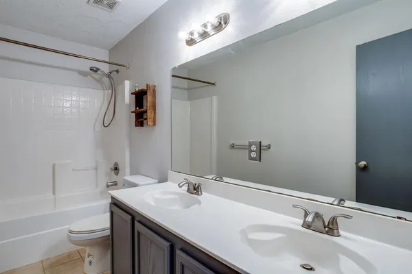 a close view of a bathtub in a bathroom