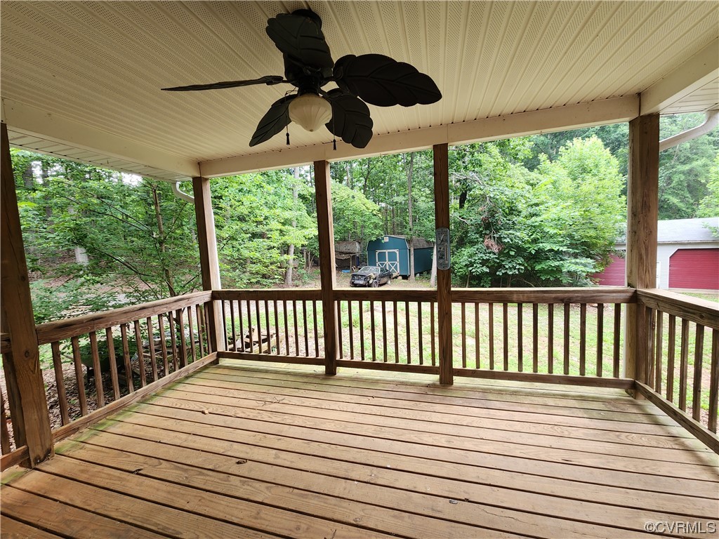 5920 Community House Road Columbia, VA 23038 - Photo 15 of 19 a view of balcony with wooden floor & fence