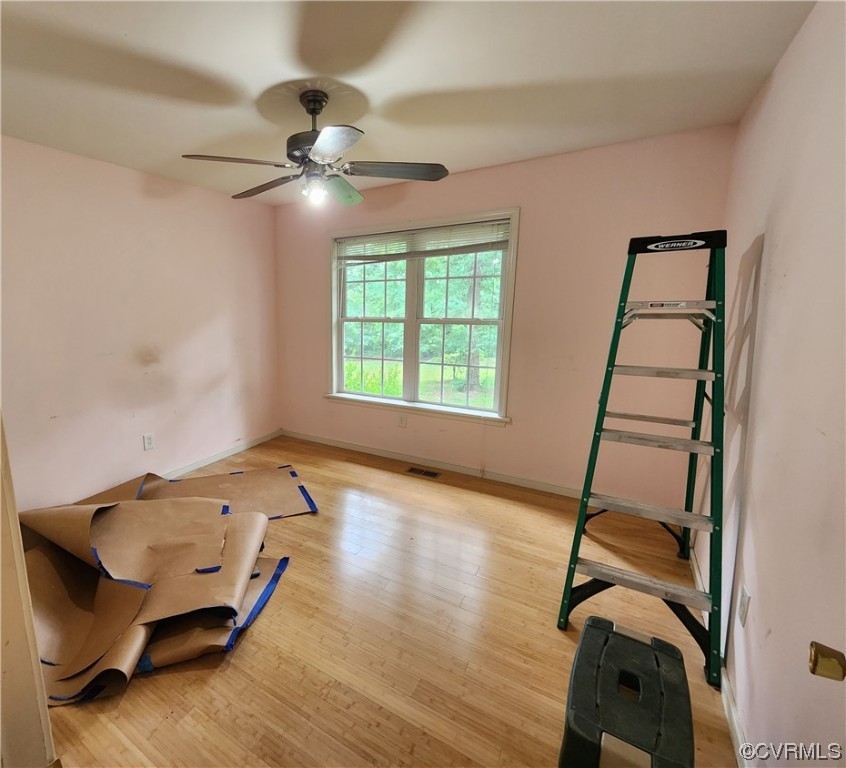 5920 Community House Road Columbia, VA 23038 - Photo 9 of 19 a room with gym equipment and a window