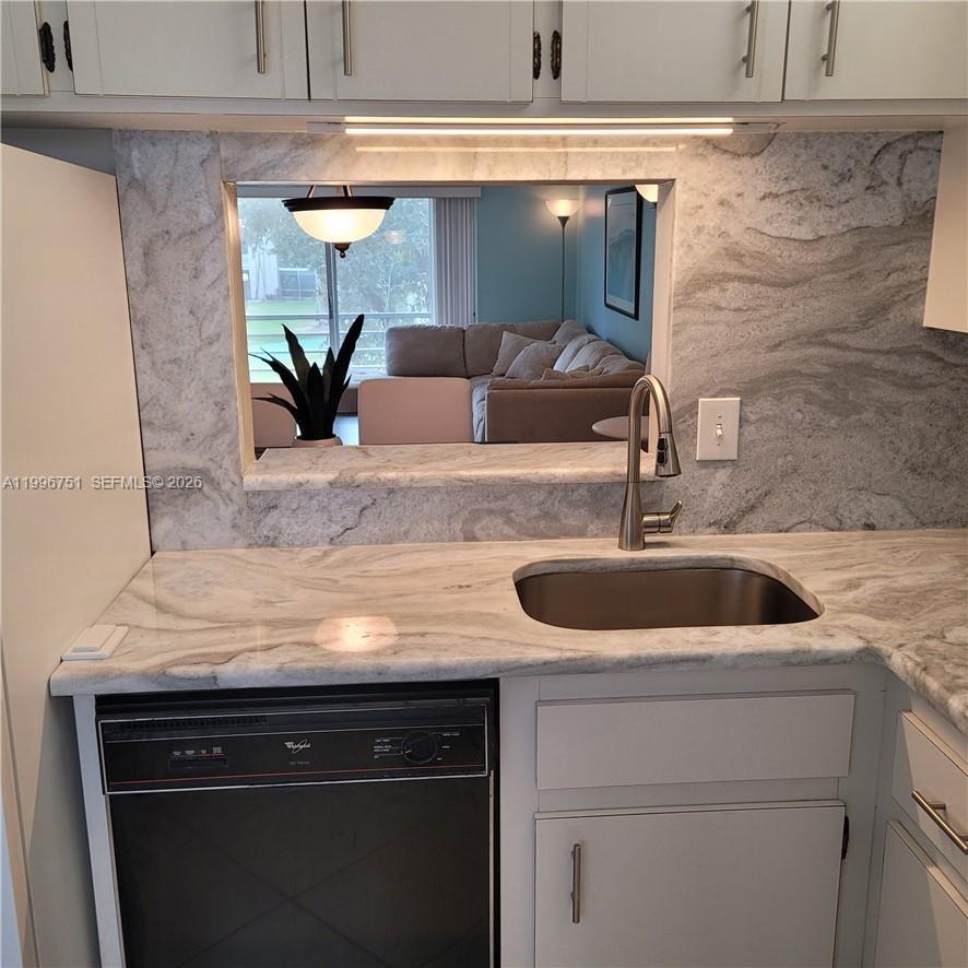 3774 Inverrary Boulevard, Unit 206P Lauderhill, FL 33319 - Photo 5 of 17 a close view of sink and tap