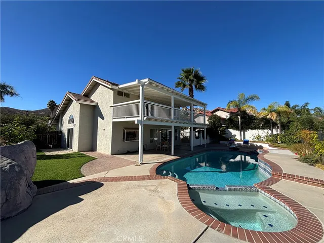 a view of a house with a swimming pool
