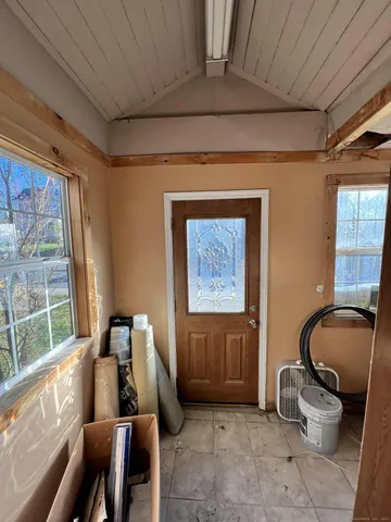 a room with furniture and windows