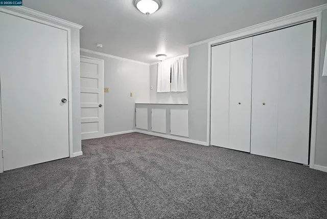 an aerial view of a house with yard and outdoor seating