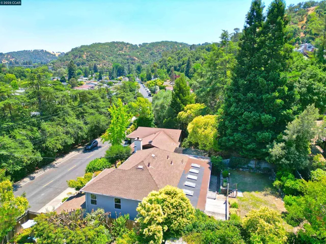 a view of a city with a mountain