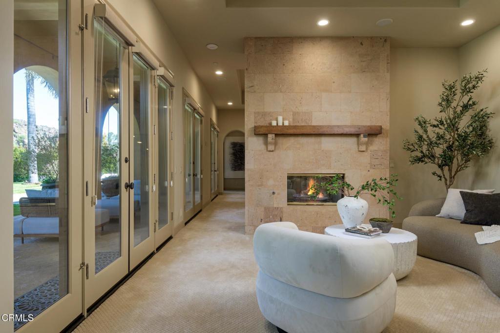 11113 Rocky High Road Camarillo, CA 93012 - Photo 22 of 48 a living room with furniture and a fireplace