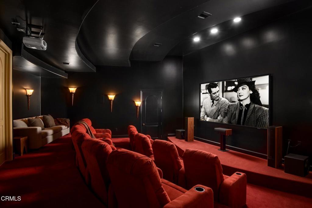 11113 Rocky High Road Camarillo, CA 93012 - Photo 25 of 48 a media room with lots of chairs and a projector screen