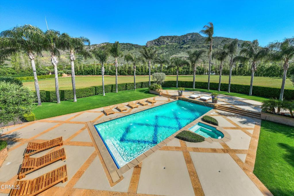 11113 Rocky High Road Camarillo, CA 93012 - Photo 30 of 48 a view of a backyard with a patio and swimming pool