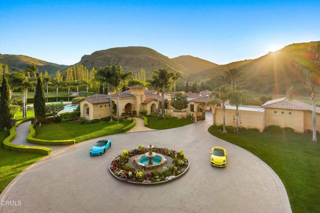 an aerial view of a house with a garden
