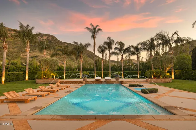 a view of a play ground with a sink and a mirror