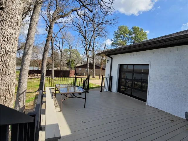 a view of balcony with furniture