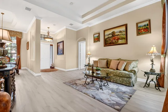 a bedroom with a bed and a flat tv screen