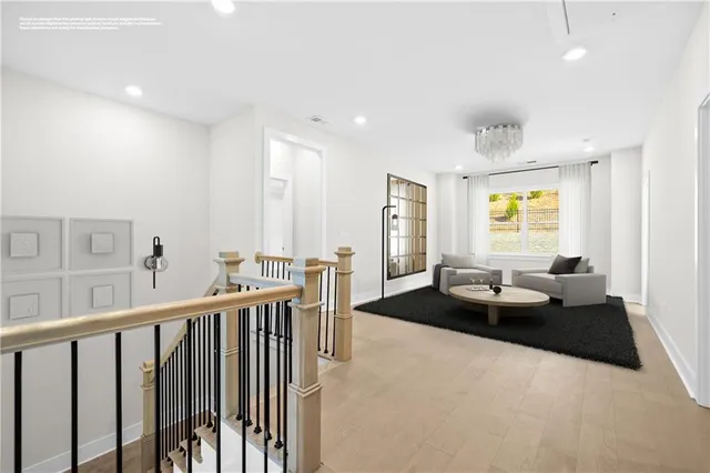 an empty room with windows and closet