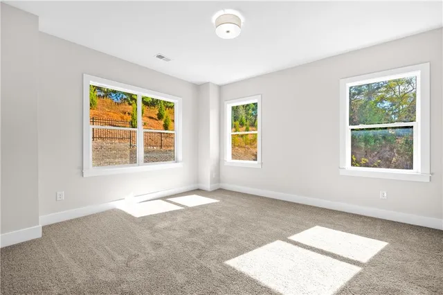 a picture of a room with a white wall and a picture