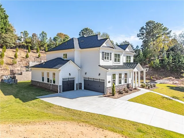 a view of a dining room and a table and chairs in a room