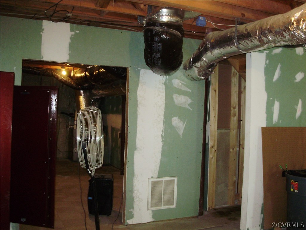 3720 Cottrell Road Richmond, VA 23234 - Photo 44 of 49 Basement view from fireplace to mechanical area