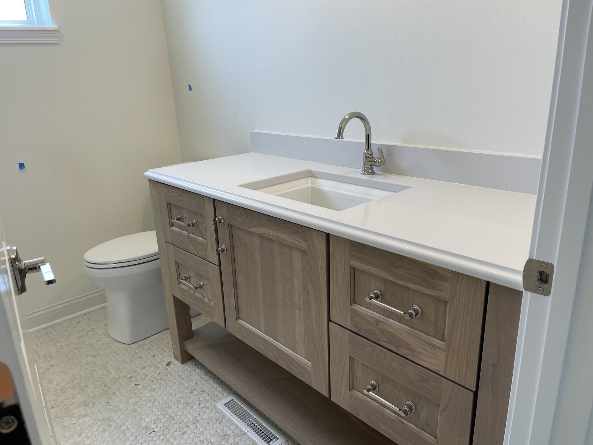 W358-n6309 W358-n6309 Ennis Road Oconomowoc, WI 53066 - Photo 33 of 47 Hall Bathroom