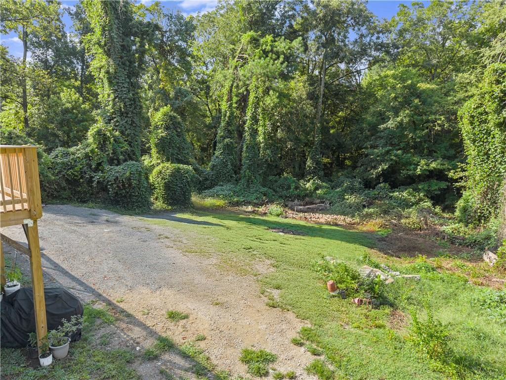 5626 Austell Powder Springs Road Southwest Austell, GA 30106 - Photo 14 of 36 a view of backyard with green space