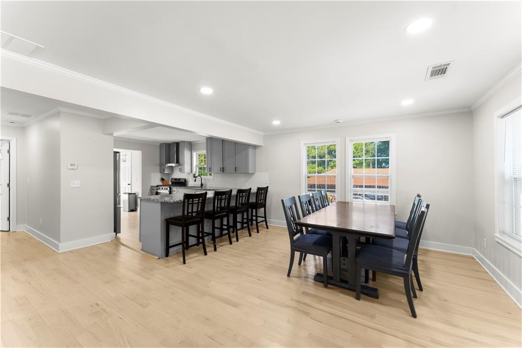 5626 Austell Powder Springs Road Southwest Austell, GA 30106 - Photo 17 of 36 a view of a dining room with furniture