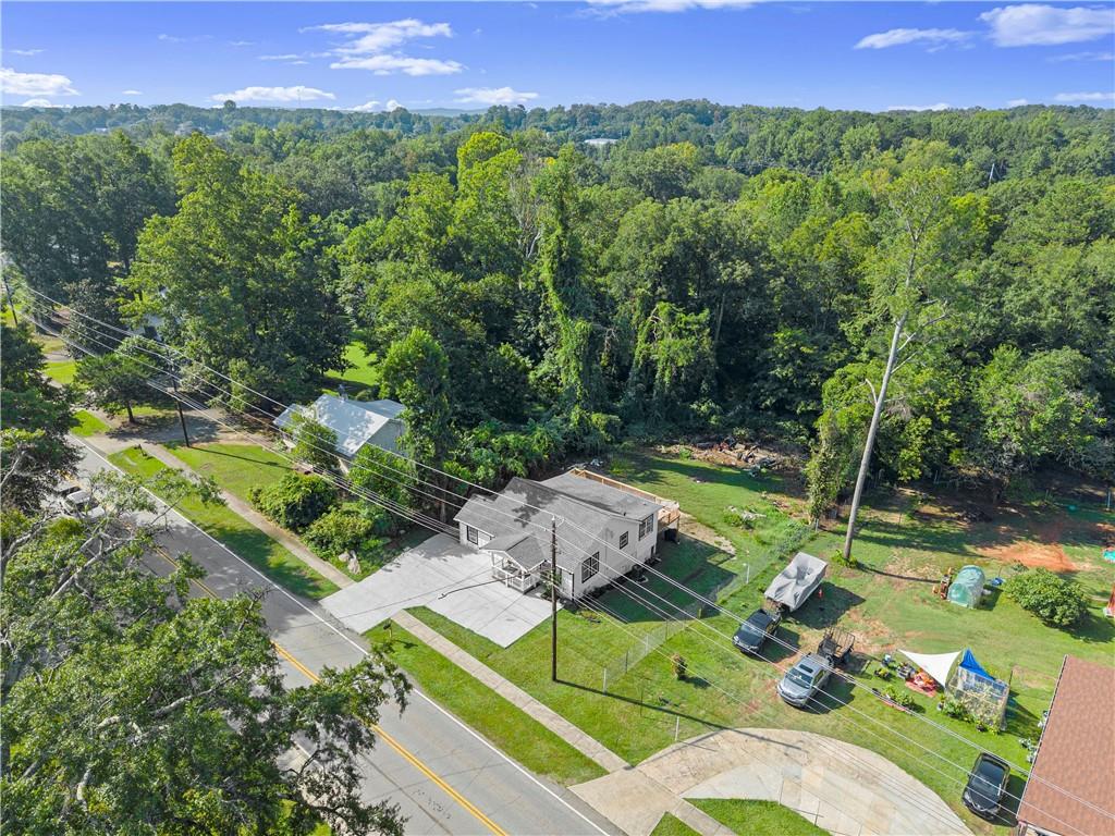 5626 Austell Powder Springs Road Southwest Austell, GA 30106 - Photo 3 of 36 a view of a table and chairs in patio