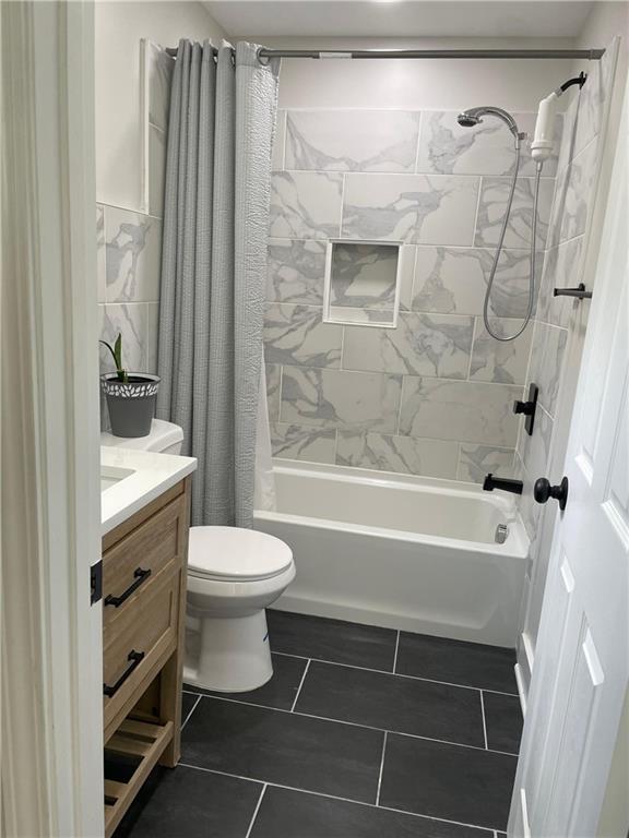 5626 Austell Powder Springs Road Southwest Austell, GA 30106 - Photo 33 of 36 a bathroom with a sink toilet and shower