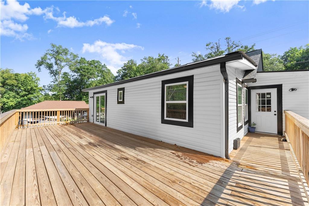 5626 Austell Powder Springs Road Southwest Austell, GA 30106 - Photo 10 of 36 a view of a house with a patio