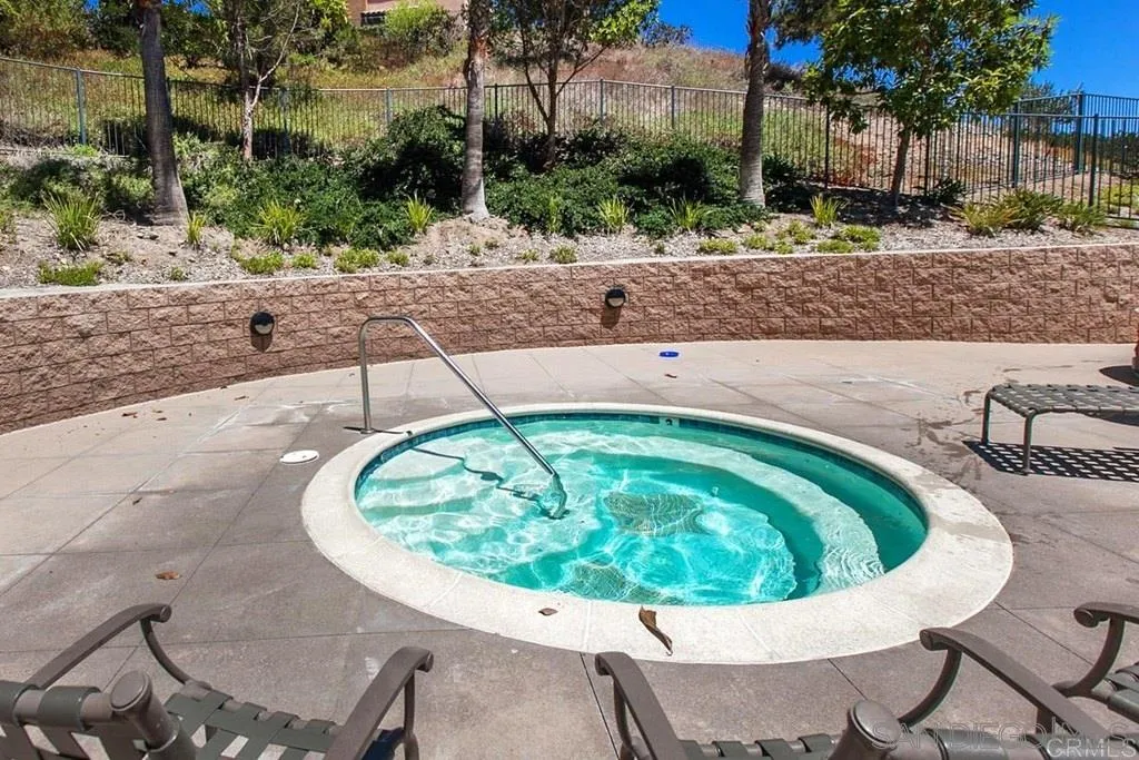 4103 Karst Road Carlsbad, CA 92010 - Photo 14 of 16 a swimming pool with outdoor seating and yard