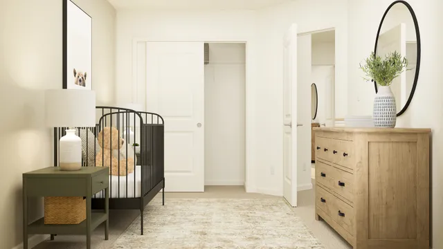 a view of a hallway with furniture and a mirror