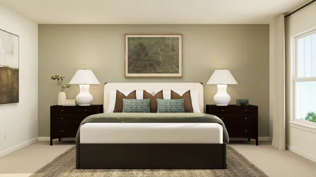 a bedroom with bed and lamp