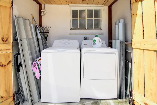 a utility room with dryer and washer
