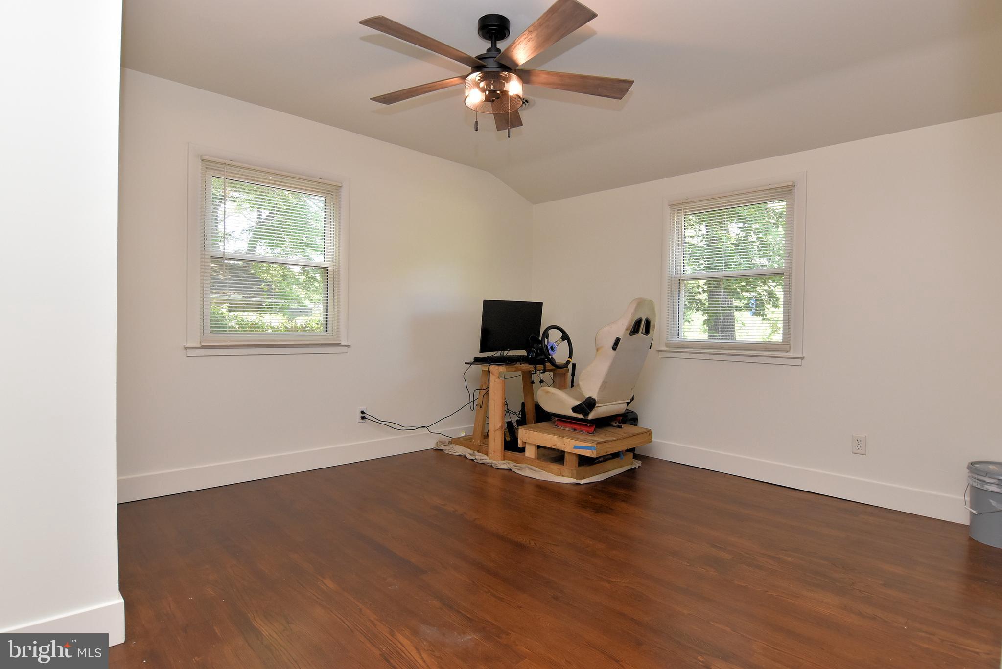 9012 Concord Road Seaford, DE 19973 - Photo 21 of 24 a living room with furniture window and gym equipment