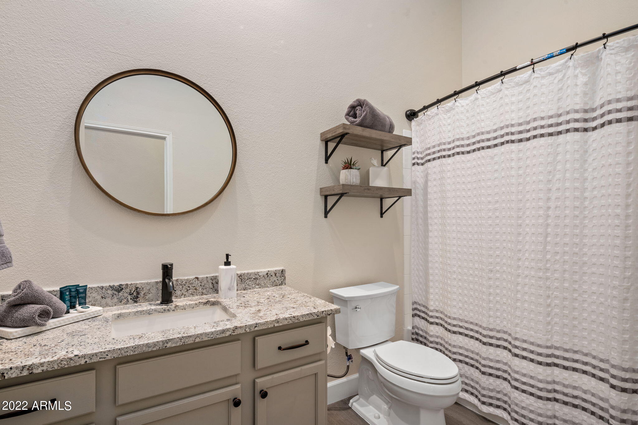 8245 East Bell Road, Unit 243 Scottsdale, AZ 85260 - Photo 30 of 51 Guest Bathroom