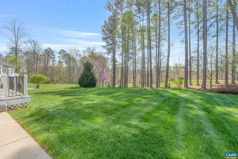 a front view of house with yard and seating area
