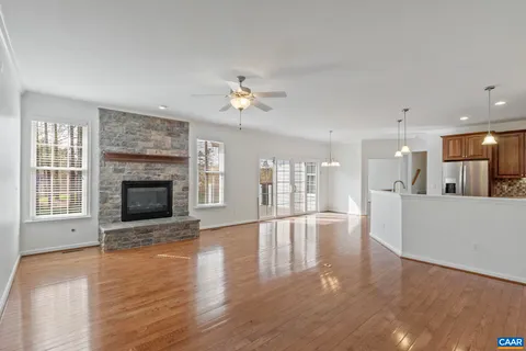 a tennis court with trees in the background