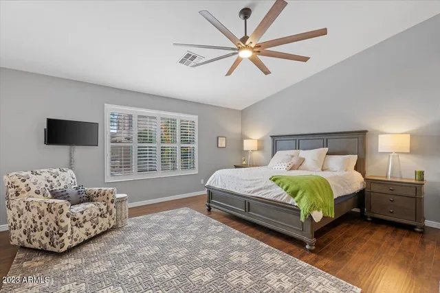 a bedroom with a bed and a closet