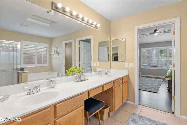 a white bath tub sitting next to a window